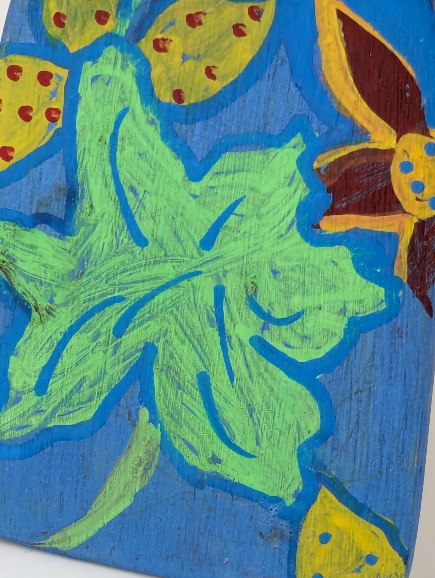 Close up of a colorful decorative spatula with floral design