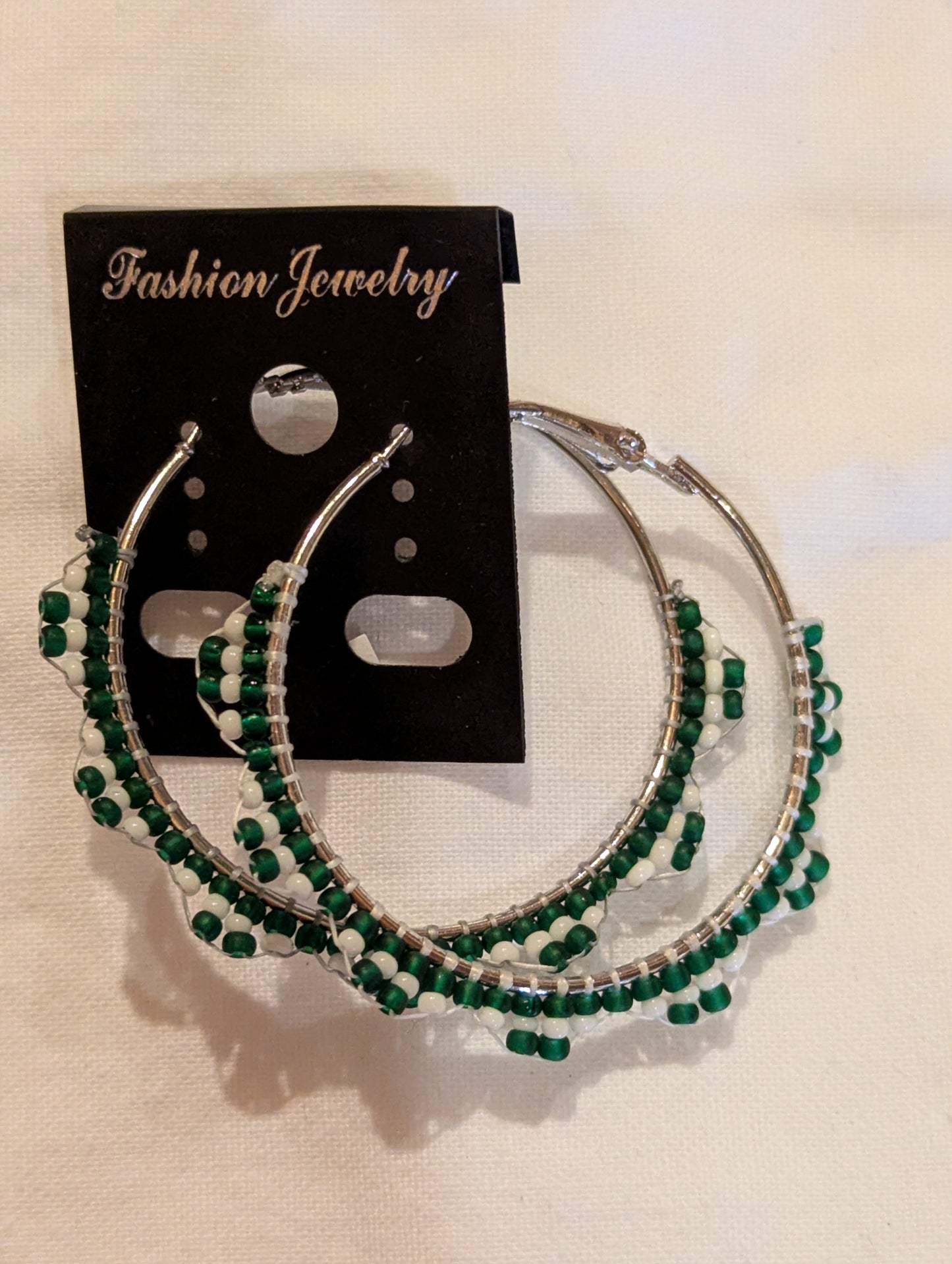 Earrings: Green and White beaded hoops