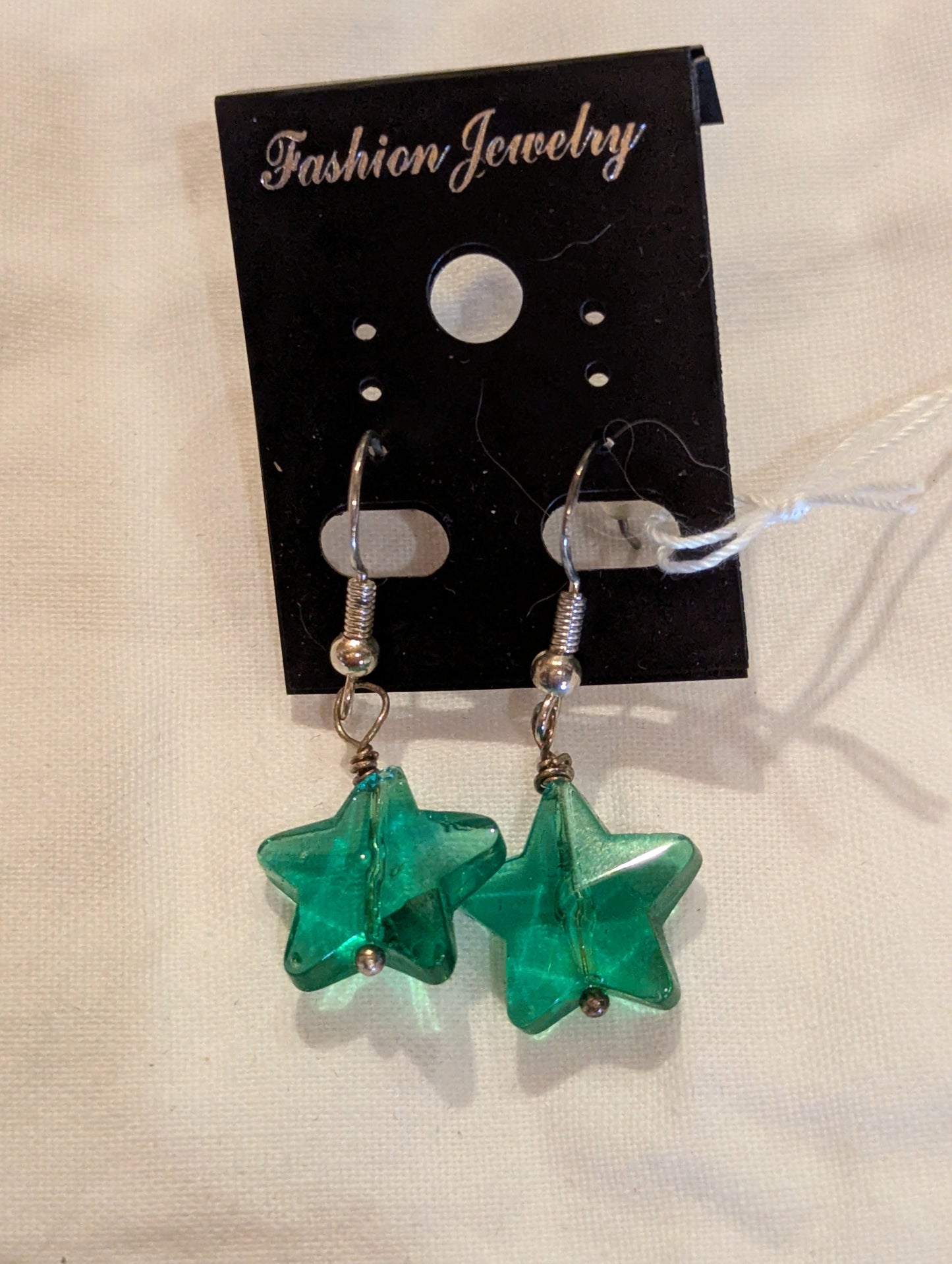 Earrings: Green glass stars