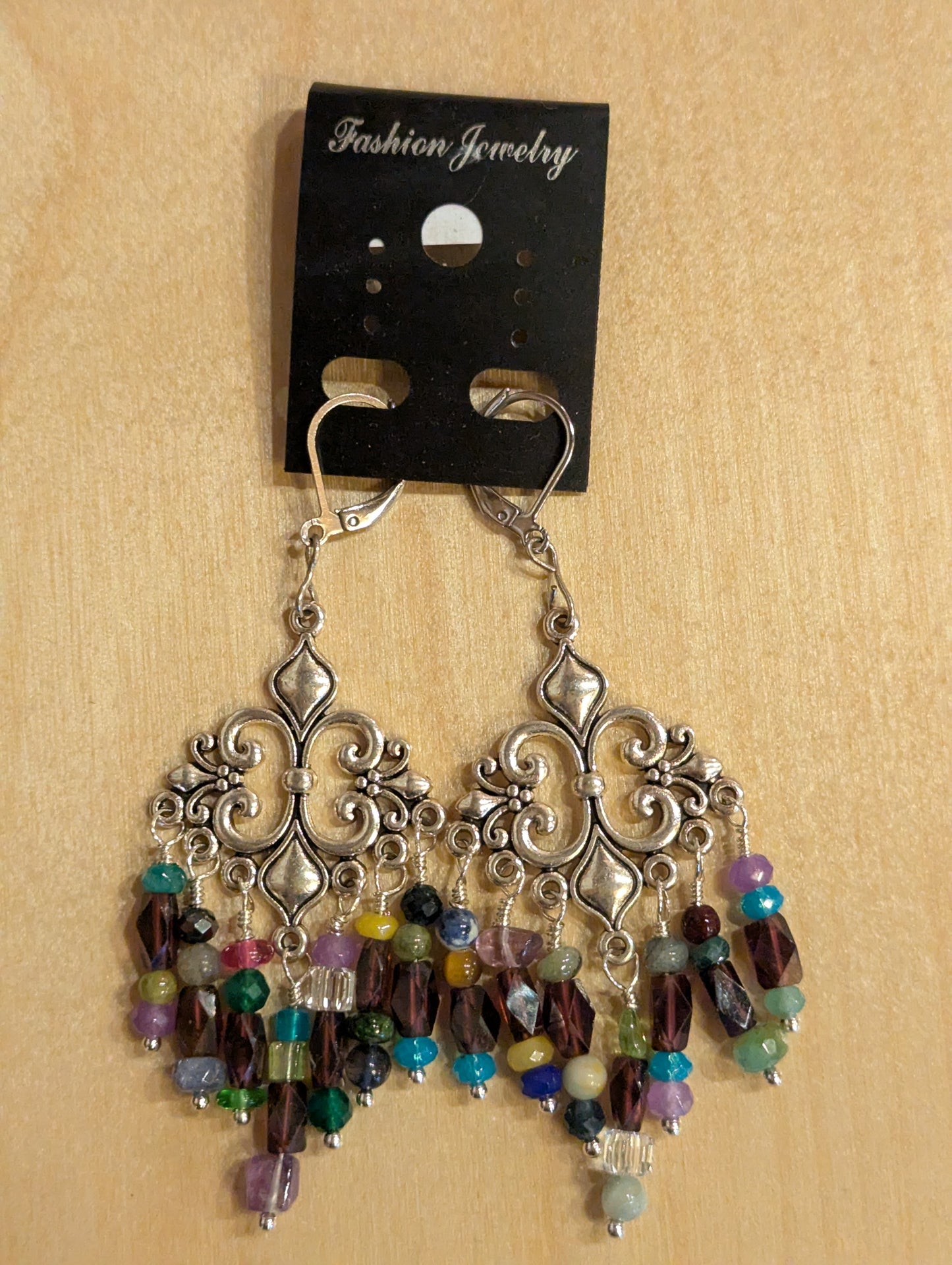 Earrings: Colorful silver fleur-de-lis