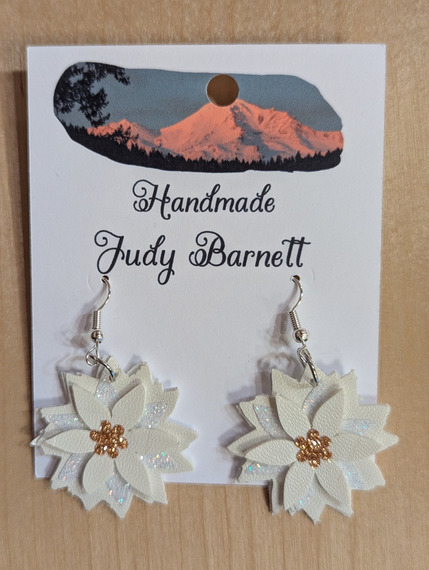 White poinsettia earrings made of paper