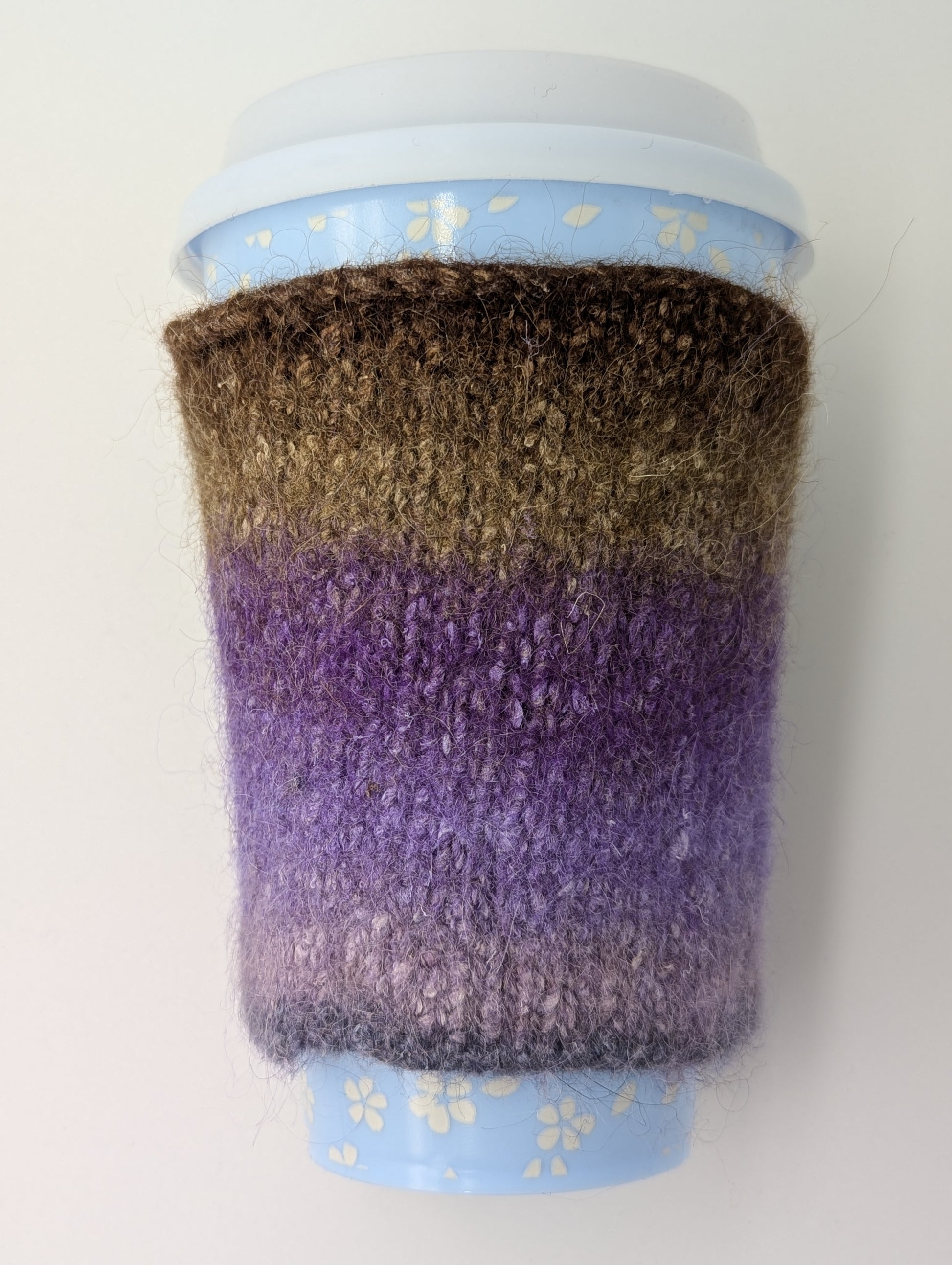 Mug cozy with a brown to purple color gradient