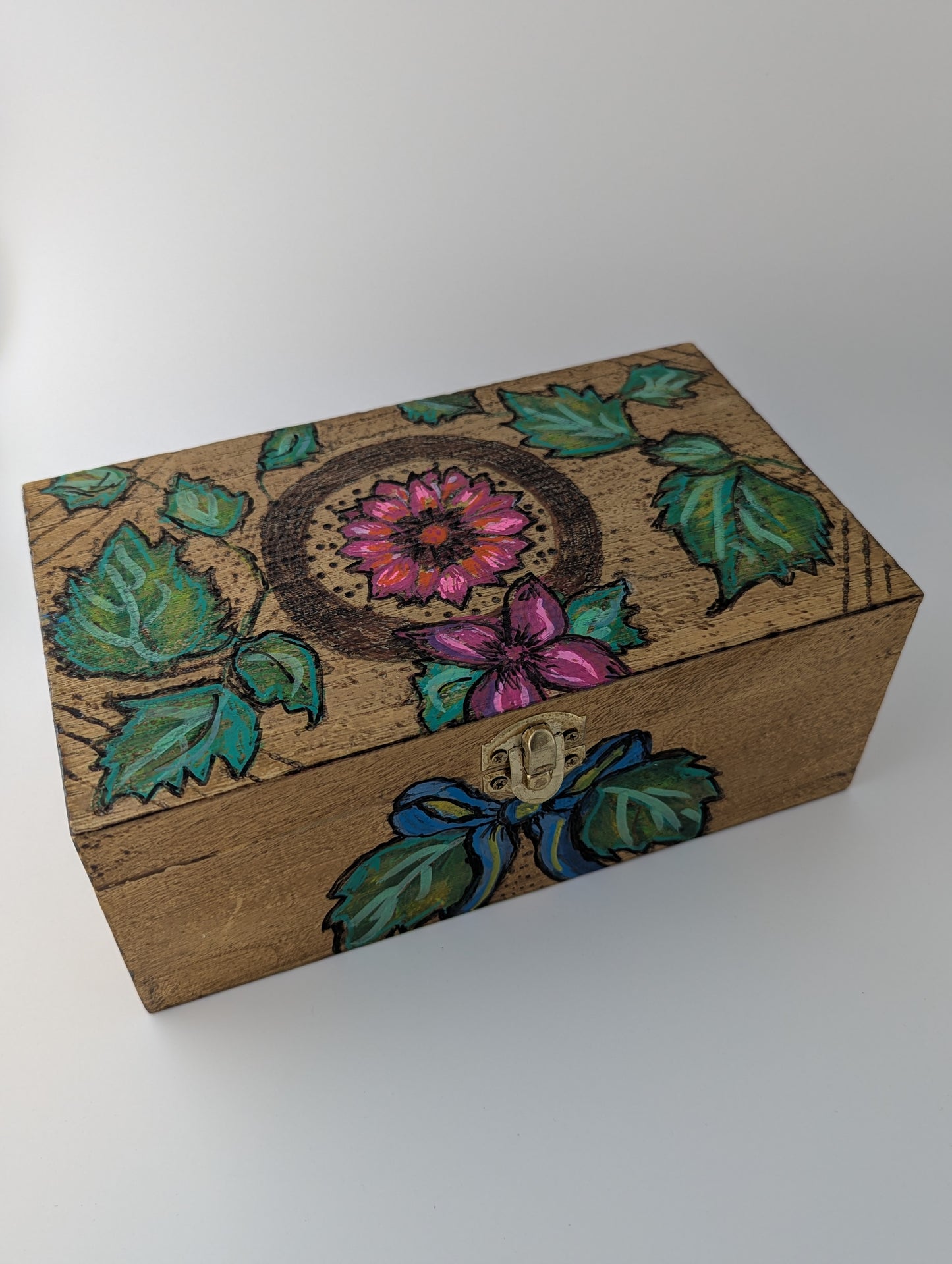 Wooden box with floral design featuring a dahlia