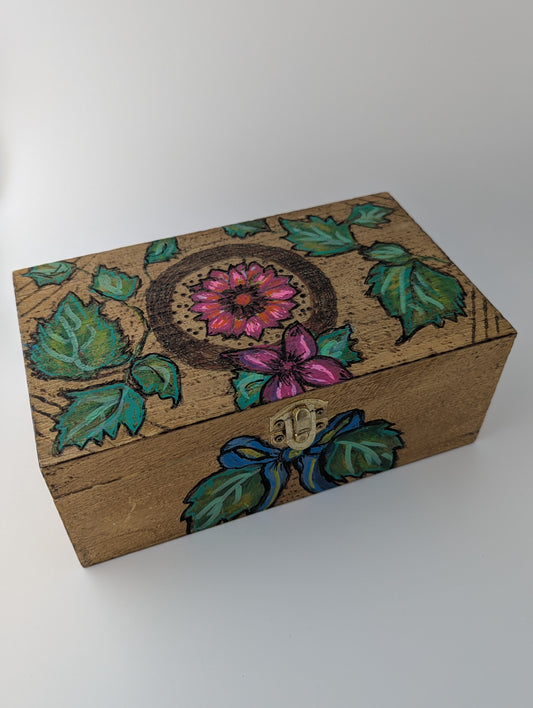 Wooden box with floral design featuring a dahlia