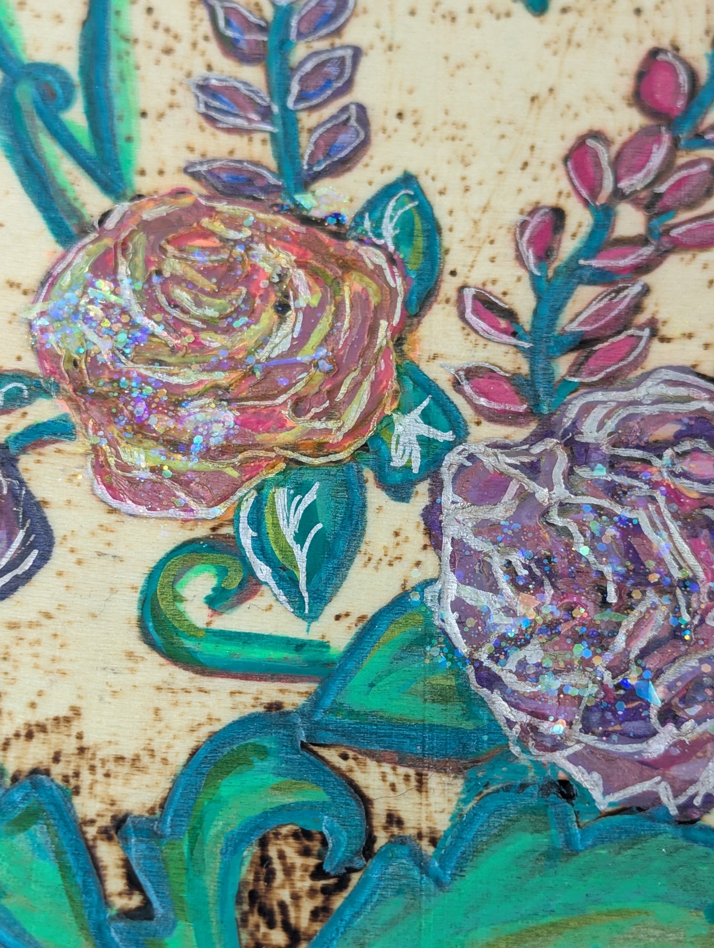 Close up of a decorative wooden box with floral pattern