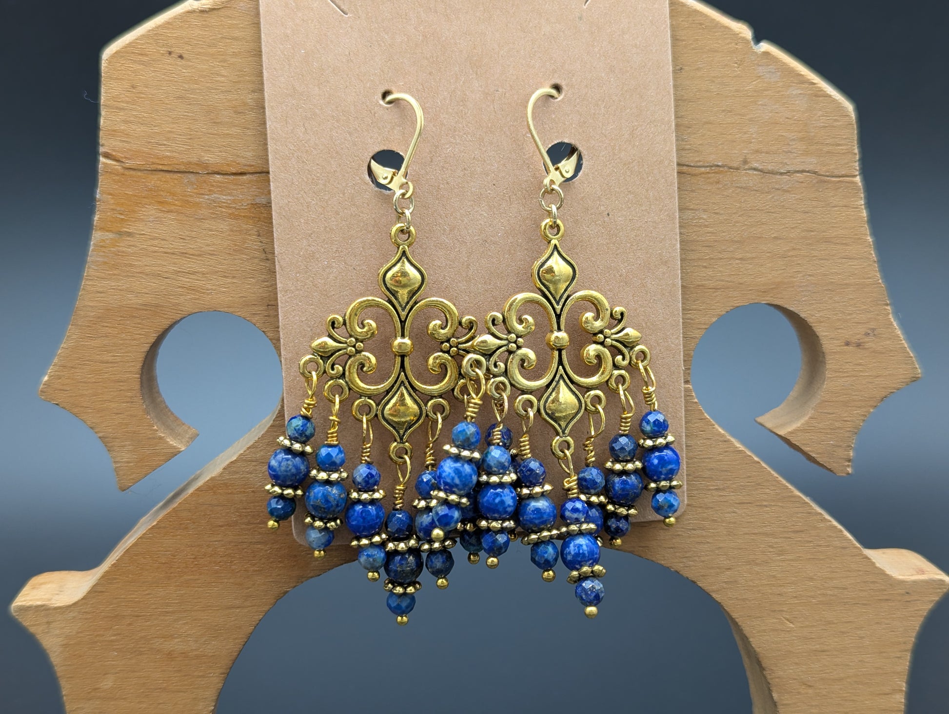 Ornate blue and gold earrings.
