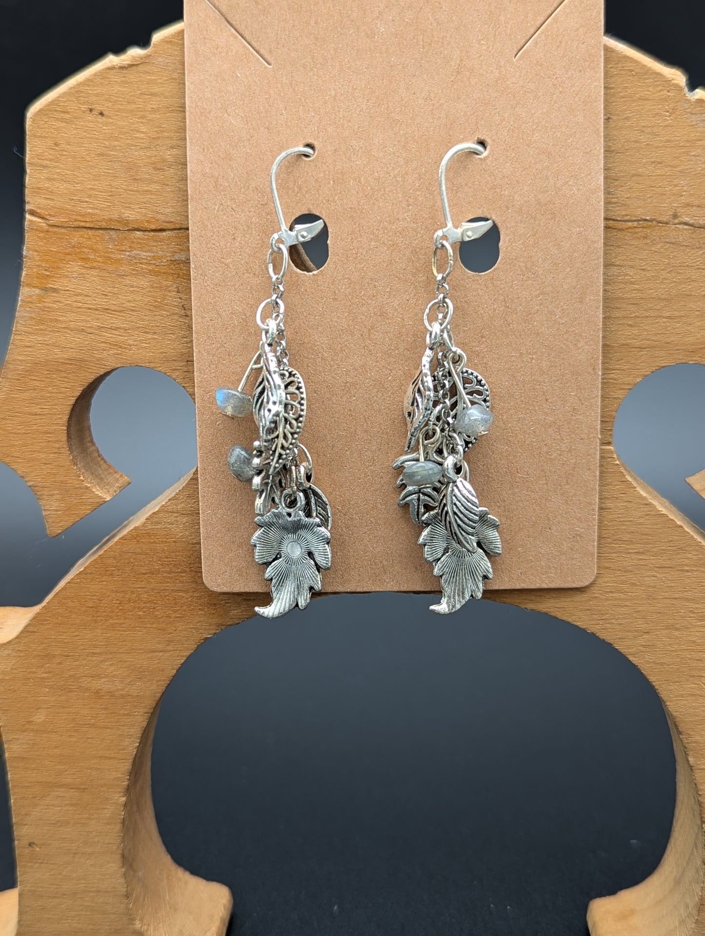 Silver leaf earrings with labradorite gemstone accents.