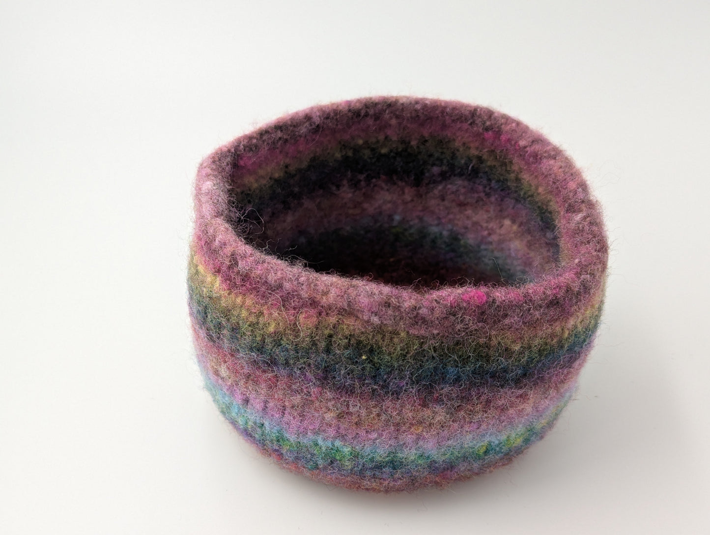 One of the three heather flower colored felted bowls