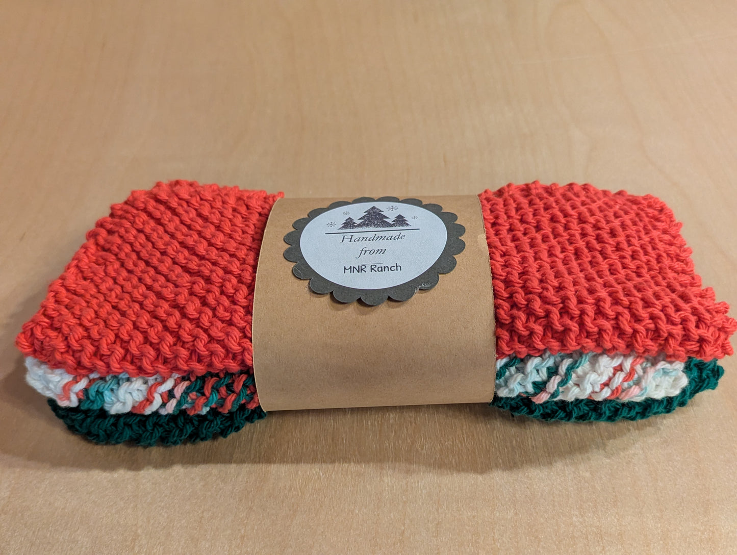 A set of three towels in classic Christmas colors for the holiday season