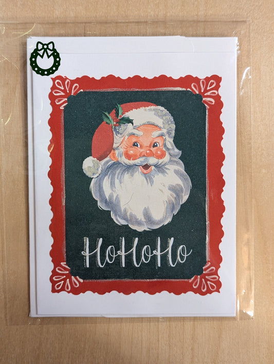 Vintage-style Santa Claus card with 'Ho Ho Ho' text with a green background and a red border.
