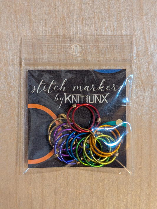 Knitting and crochet stitch markers by KnitLinx for knitting needles size 9 through 13. Made from metal in rainbow colors.