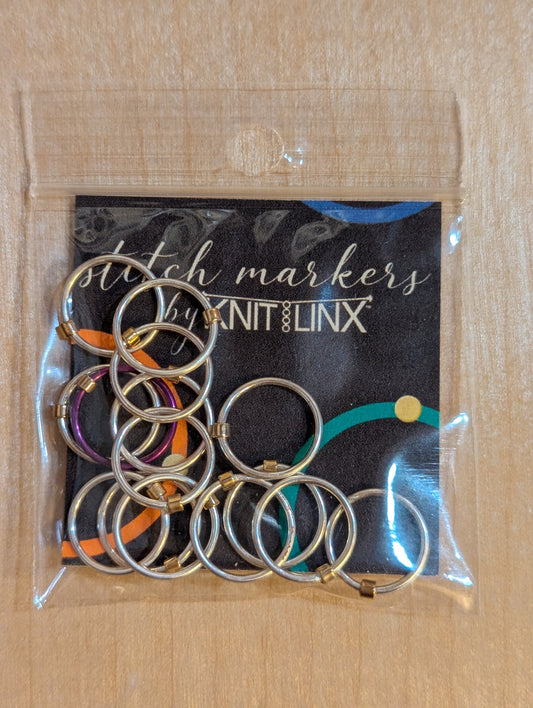 Knitting and crochet stitch markers by KnitLinx for knitting needles size 9 through 13. Made from metal, silver color.