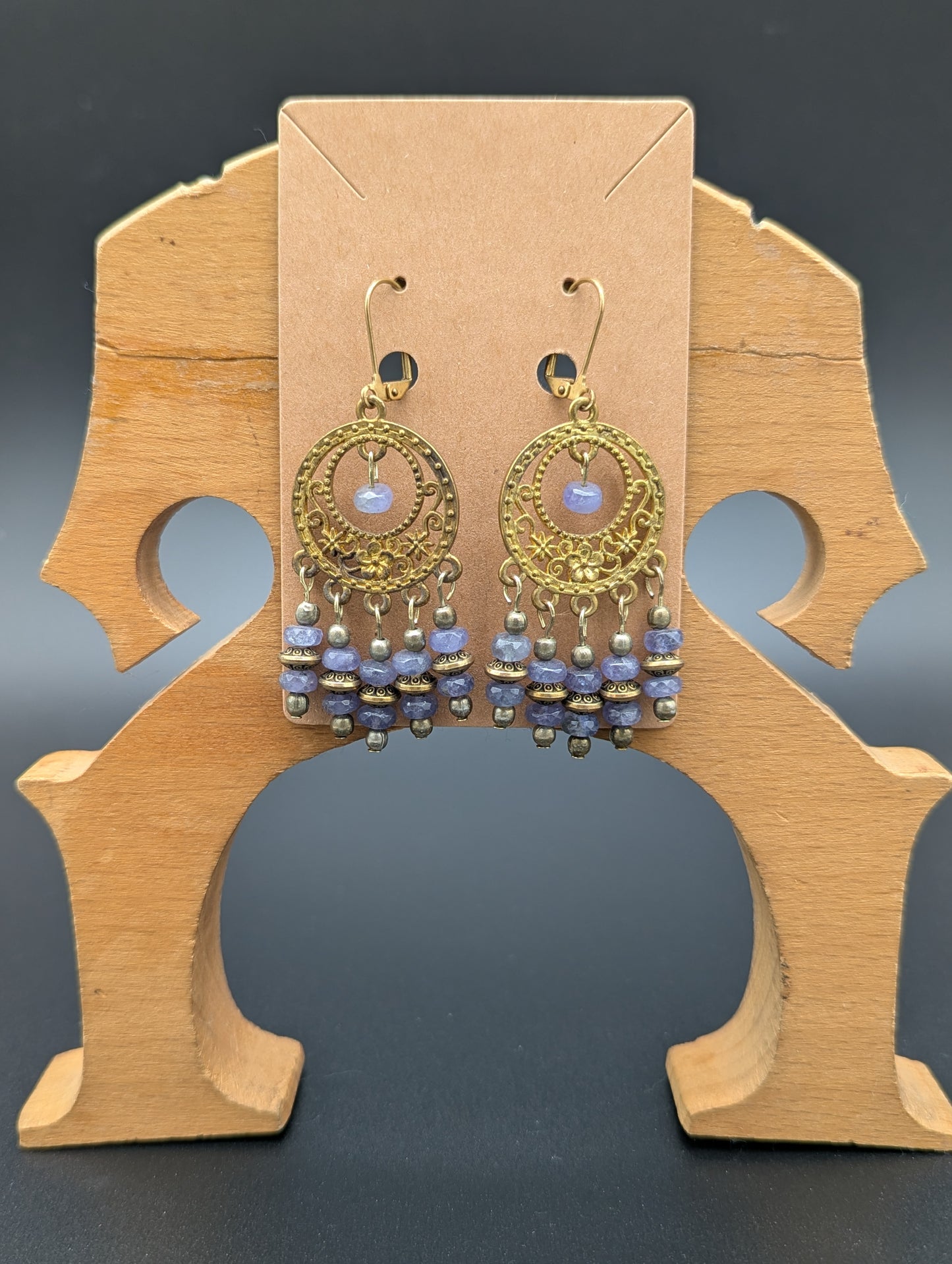 Ornate antiqued gold earrings with labradorite gemstone beads. 