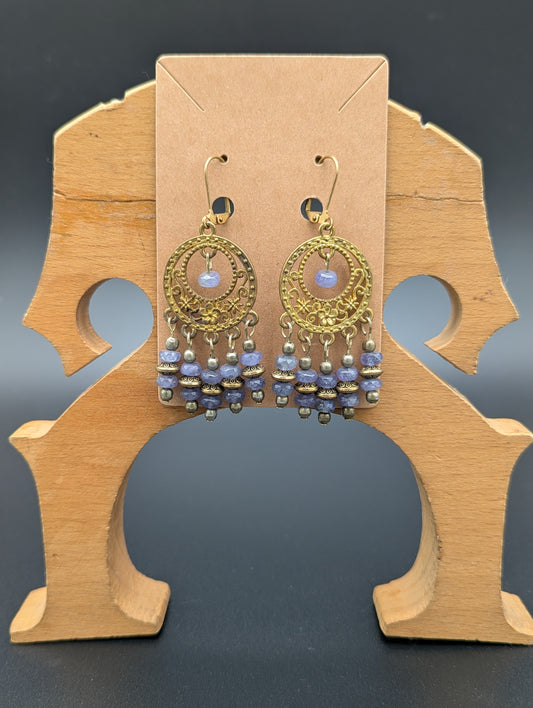 Ornate antiqued gold earrings with labradorite gemstone beads. 