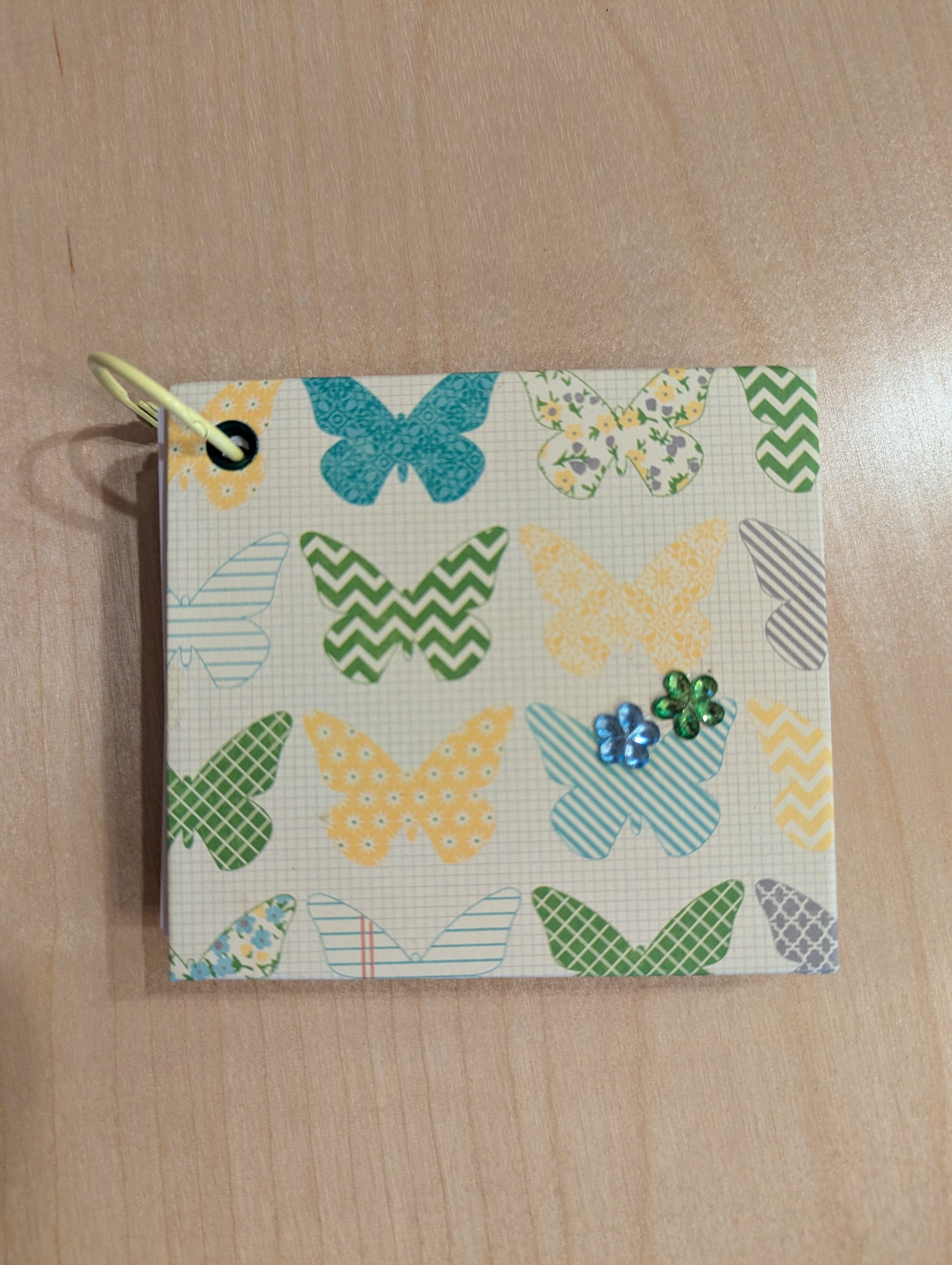 Hand made notebook. The ring clip makes this sweet little notepad easy to keep anywhere.