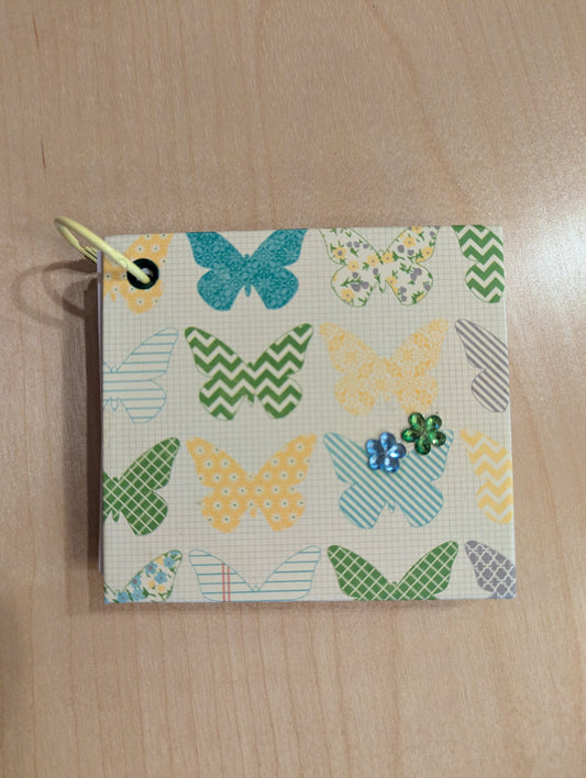 Hand made notebook. The ring clip makes this sweet little notepad easy to keep anywhere.