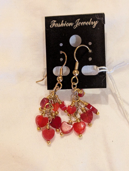Earrings: Cascading red hearts