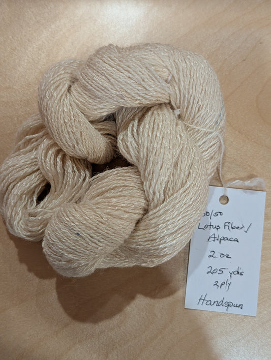 Hand spun 50% Lotus fiber, 50% alpaca 205 yds, 2 oz