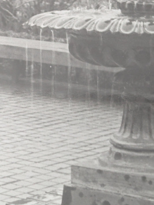 Close up of a black and white photograph of the fountain in Lithia Park, Ashland, Oregon.