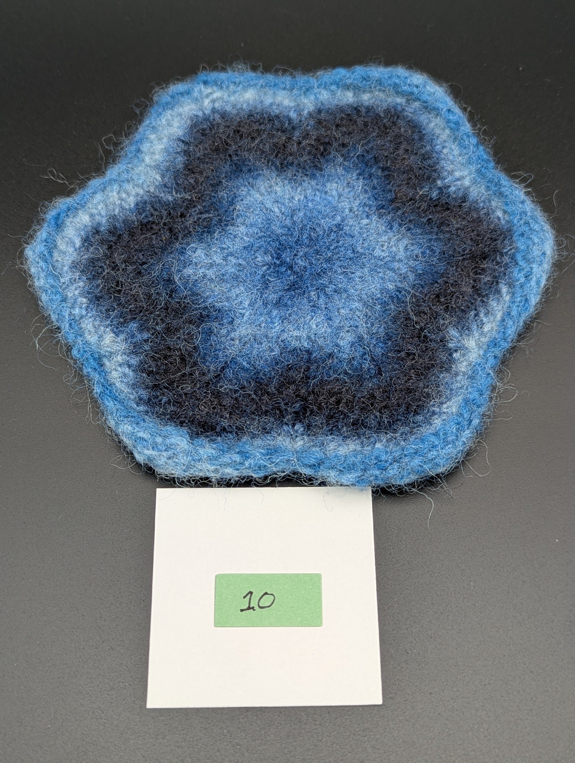 Blue hand knitted and felted coaster. This coaster is number 10.