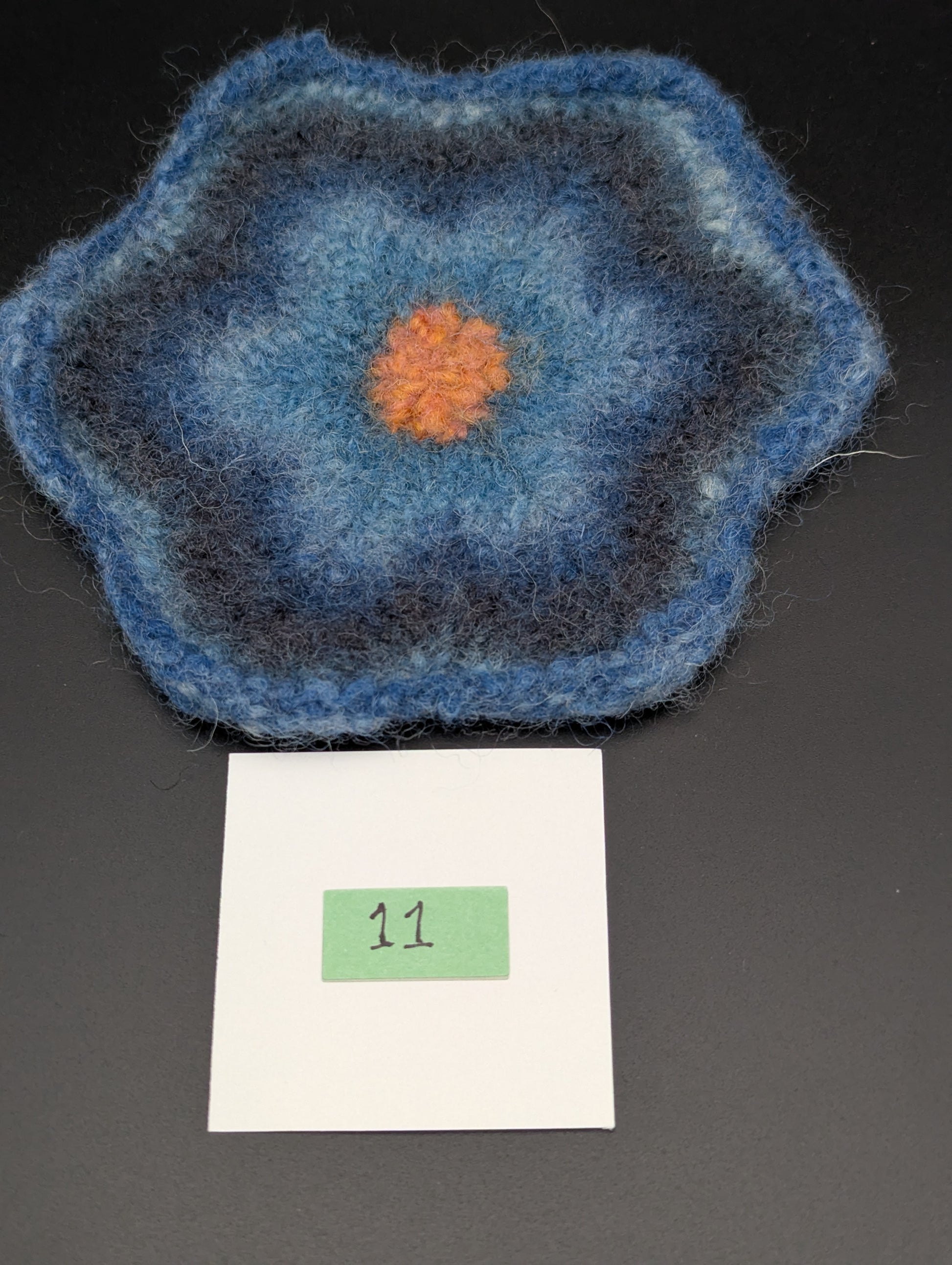 Blue hand knitted and felted coaster. This coaster is number 11.