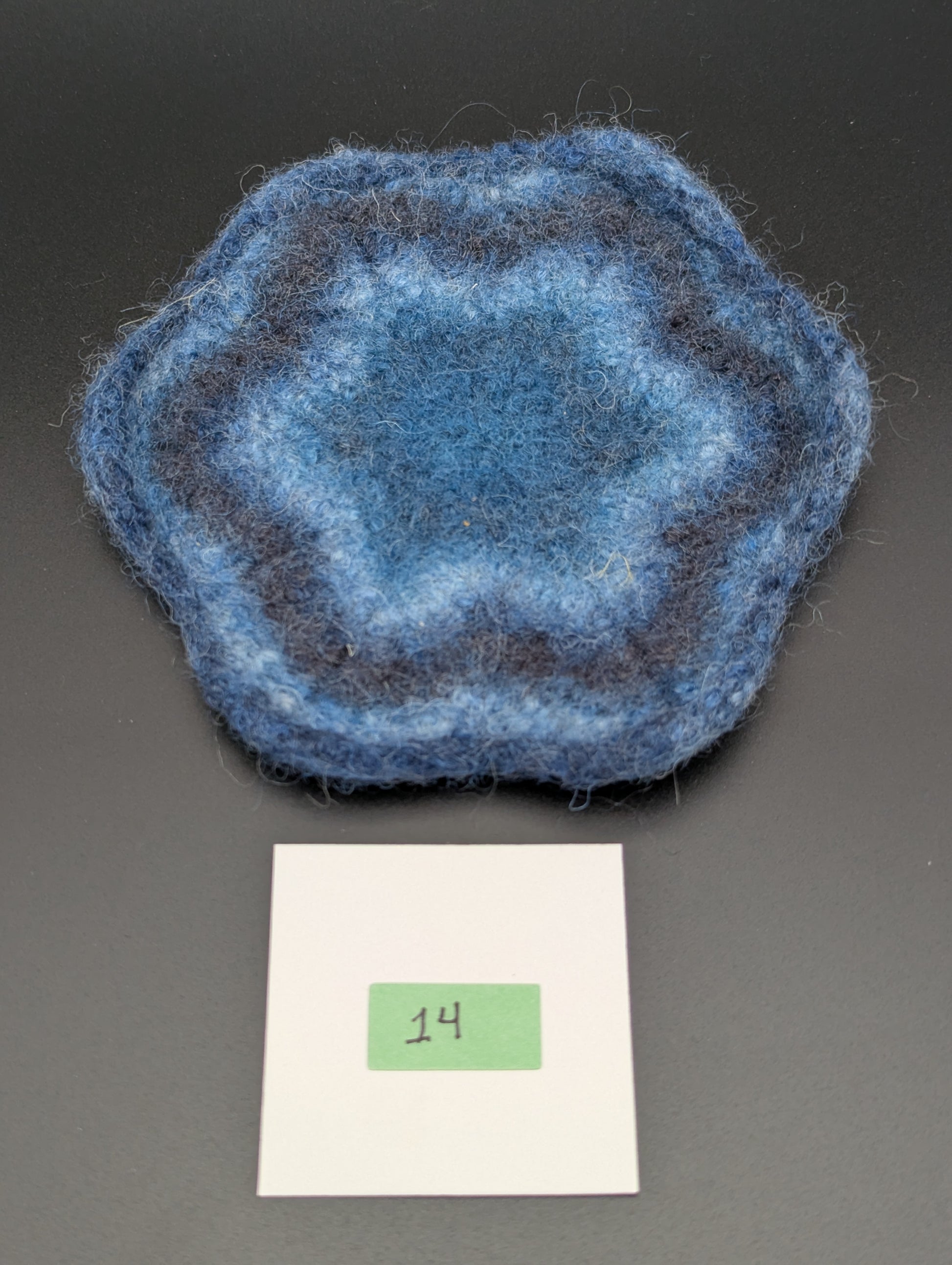 Blue hand knitted and felted coaster. This coaster is number 14.