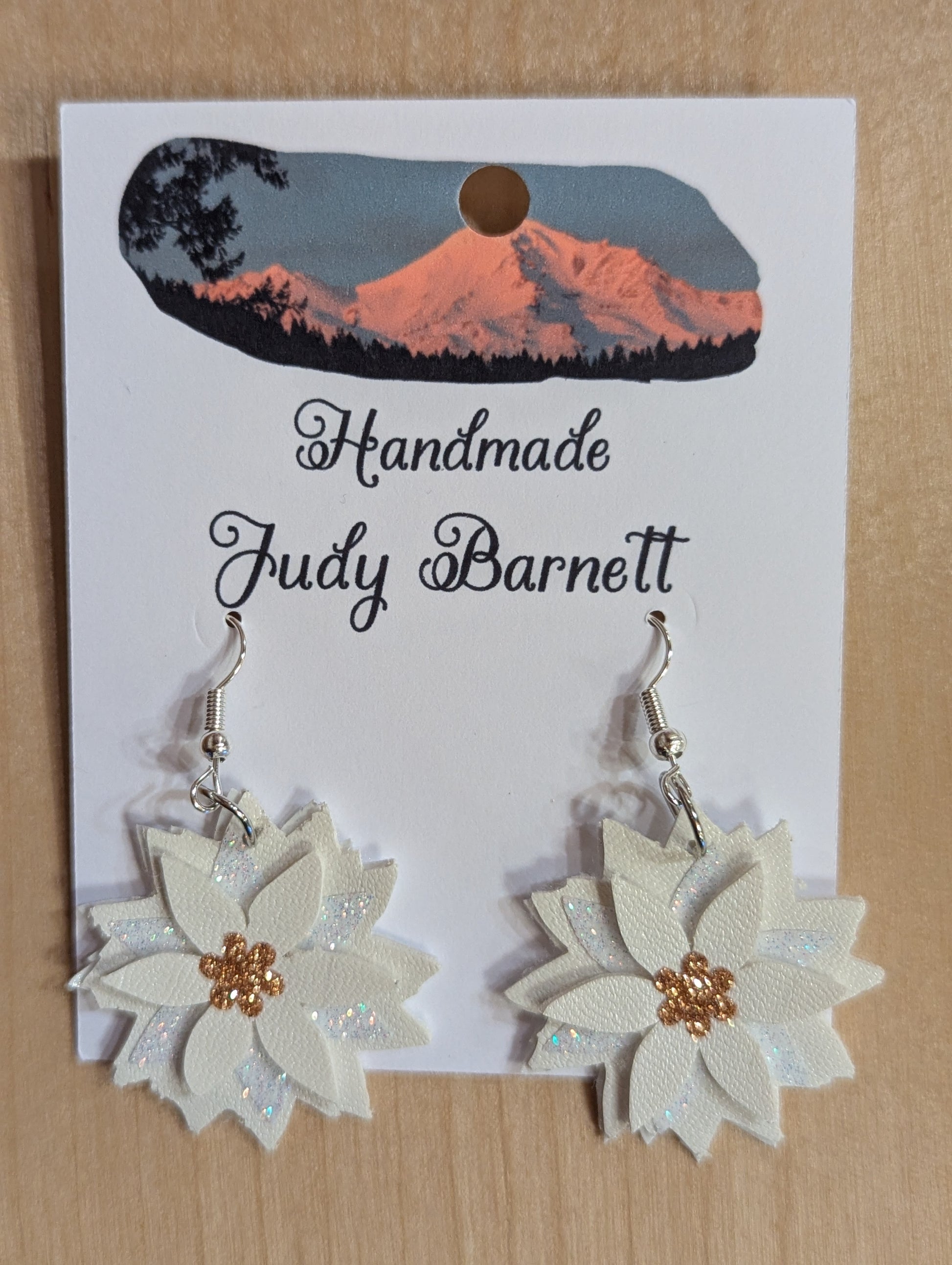 White poinsettia earrings made of paper