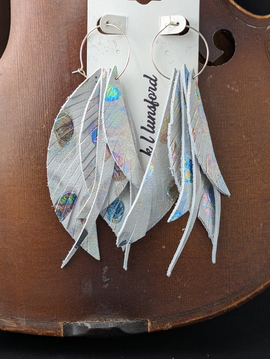 Leather earrings. Feather shaped light gray leather with sparkly and shiny delicate iridescent bubbles. 4.5 inches