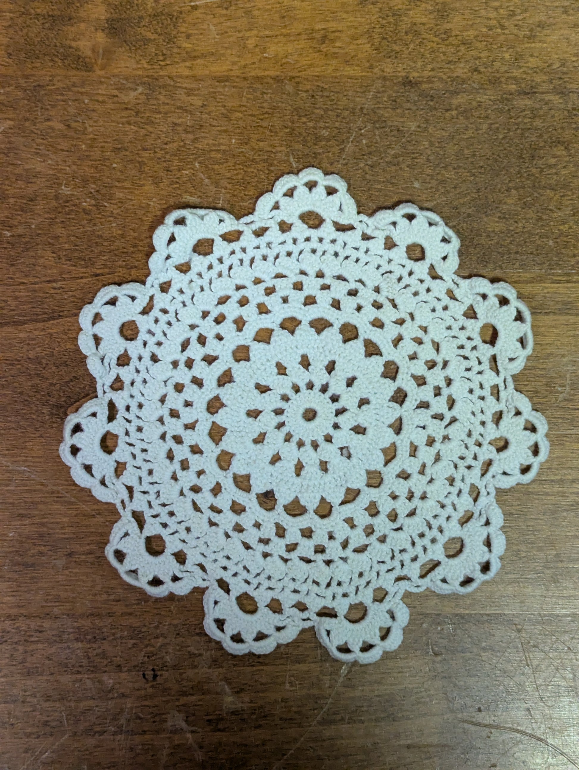 Hand crochet coaster in a medallion pattern