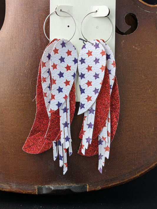 Leather earrings. Red, white and blue with sparkles and stars on silver hoops. 5 inches in length