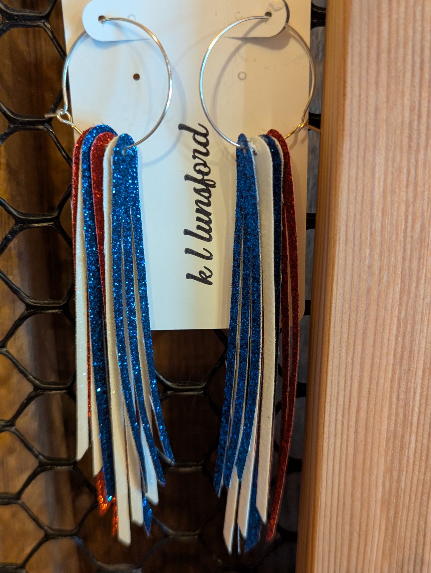 Leather earrings on silver hoops. Sparkly red, white and blue, fun for patriotic celebrations! 5 inches in length