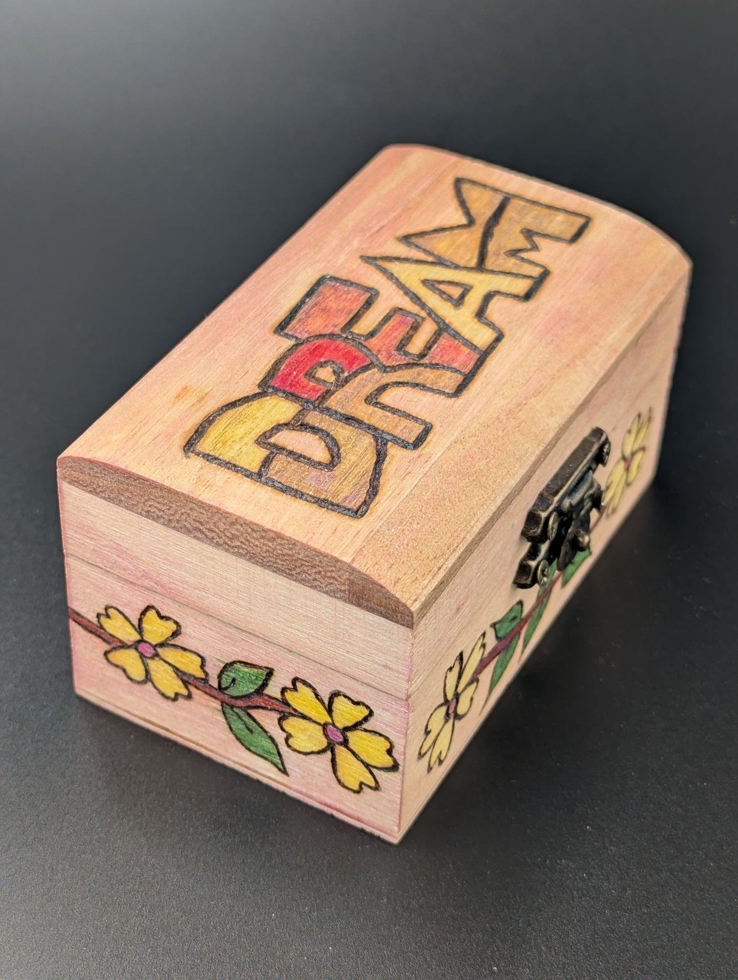 Wooden box with 'Dream' and floral designs