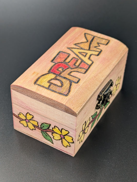 Wooden box with 'Dream' and floral designs