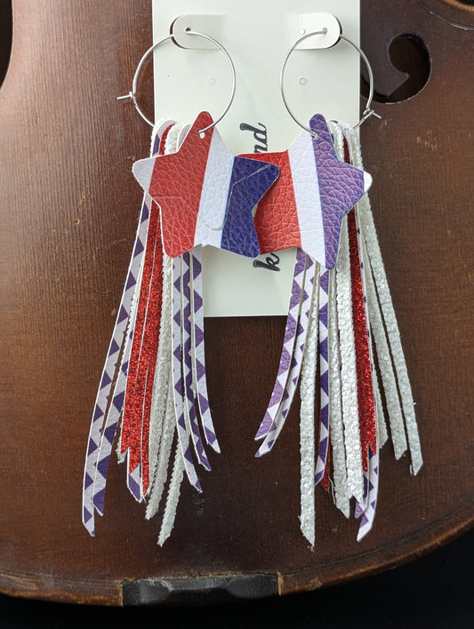 Leather earrings on silver hoops. Red, white and blue with stars and stripes. 5 inches in length